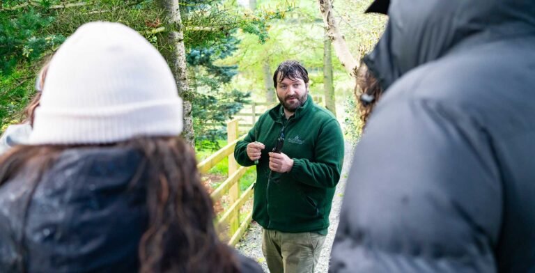 Guide informing people in the woods 